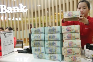 Đẩy mạnh xử lý nợ xấu sẽ khơi thông nguồn vốn, từ đó tạo cơ hội cho ngân hàng giảm lãi suất