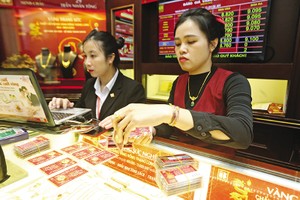 Giá vàng khó có thể giảm trong trung và dài hạn. Ảnh: Đức Thanh 