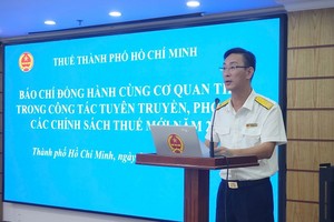 Ông Đoàn Minh Dũng, Trưởng Thuế TP.HCM chia sẻ tại Hội thảo.