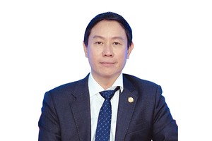 TS. Huỳnh Trung Minh, chuyên gia tài chính, ngân hàng 