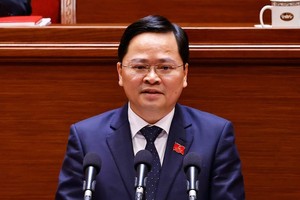 Phó Trưởng Ban Chính sách, chiến lược Trung ương Nguyễn Anh Tuấn trình bày tham luận - Ảnh: TTXVN. 