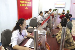 Thước đo của cải cách là số thủ tục được rút gọn, chi phí tuân thủ của người dân và doanh nghiệp giảm. Ảnh: Đức Thanh 