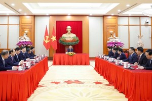 Quang cảnh cuộc điện đàm. (Ảnh: TTXVN)