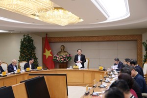 Phó Thủ tướng Chính phủ Hồ Quốc Dũng chủ trì cuộc họp với Bộ Tư pháp và các bộ, cơ quan liên quan về tình hình triển khai, xây dựng một số dự án luật, nghị quyết - Ảnh: VGP.