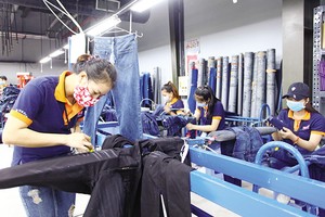 Các doanh nghiệp đã có một khởi đầu tích cực trong năm 2026. Trong ảnh: Sản xuất hàng xuất khẩu tại Công ty Dệt may Phong Phú. Ảnh: L.T