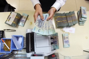  Theo quy định, các nhà băng kiểm soát tốc độ tăng trưởng tín dụng mỗi quý không được vượt quá 25% chỉ tiêu cả năm