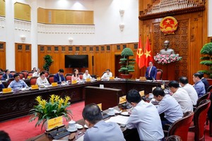 Thủ tướng Chính phủ giao 11 nhiệm vụ, giải pháp cụ thể cho từng bộ, ngành, địa phương, doanh nghiệp - Ảnh: VGP