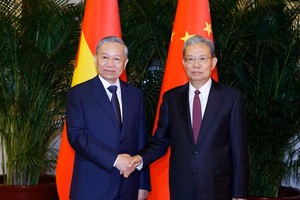 Tổng Bí thư, Chủ tịch nước Tô Lâm hội kiến Ủy viên trưởng Nhân đại toàn quốc Trung Quốc Triệu Lạc Tế. (Ảnh: Thống Nhất/TTXVN)