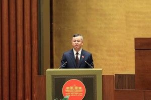 Bộ trưởng Bộ Tài chính Ngô Văn Tuấn trình bày báo cáo giải trình, tiếp thu ý kiến của các đại biểu Quốc hội về Kế hoạch Đầu tư công trung hạn 2026-2030 (Ảnh: Đức Thanh)