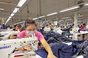 Chuyển đổi công nghệ là giải pháp giúp doanh nghiệp dệt may chống chịu trước biến động 