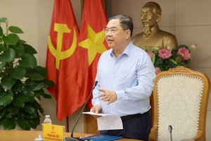 Phó Thủ tướng Thường trực Chính phủ Phạm Gia Túc làm việc với Bộ Xây dựng, một số bộ, ngành, TP. Hà Nội, TPHCM về tình hình triển khai các dự án đường sắt - Ảnh: VGP.