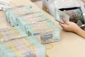 Nhà băng giảm “nệm dự phòng” để làm đẹp lợi nhuận 