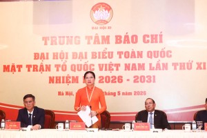 Phó Chủ tịch - Tổng Thư ký Hà Thị Nga phát biểu tại buổi họp báo. Ảnh: Quang Vinh.