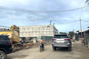 Dự án cải tạo và nâng cấp quốc lộ 14E gặp vướng mắc trong công tác giải phóng mặt bằng. Ảnh: Thanh Chung