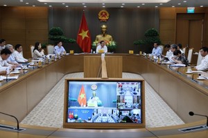 Phó Thủ tướng Thường trực Phạm Gia Túc làm việc về tình hình triển khai dự án đường sắt Lào Cai - Hà Nội - Hải Phòng - Ảnh: VGP