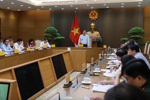 Phó Thủ tướng Thường trực yêu cầu đẩy nhanh tiến độ triển khai các dự án tuyến đường bộ cao tốc Hà Nội - Vientiane và tuyến đường sắt Vũng Áng - Vientiane - Ảnh: VGP