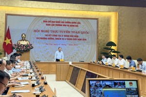 Phó Thủ tướng thường trực Chính phủ Phạm Gia Túc - Trưởng Ban Chỉ đạo 389 quốc gia chủ trì hội nghị.