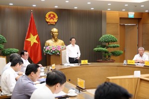 Phó Thủ tướng Hồ Quốc Dũng chủ trì Hội nghị quán triệt, thúc đẩy triển khai Chương trình Mục tiêu quốc gia xây dựng nông thôn mới, giảm nghèo bền vững và phát triển kinh tế-xã hội vùng đồng bào Dân tộc thiểu số và miền núi - Ảnh: VGP.