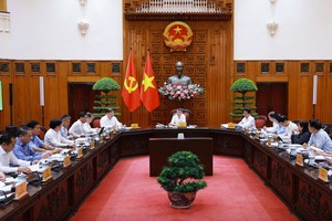 Thủ tướng chủ trì phiên họp Ban Chỉ đạo về tổ chức thi hành án, thu hồi tài sản bị chiếm đoạt, thất thoát trong các vụ án - Ảnh: VGP
