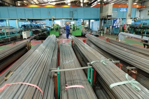 Khơi thông dòng vốn và cải thiện môi trường đầu tư được kỳ vọng tạo thêm động lực để doanh nghiệp mở rộng sản xuất - kinh doanh