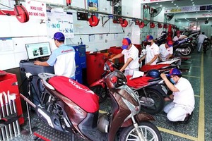 Hà Nội chuẩn bị mạng lưới kiểm định khí thải xe máy 