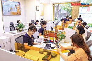 Với các quy định vừa được NHNN ban hành cũng như hàng loạt quy định trước đó, lãi suất toàn thị trường sẽ hạ nhiệt dần trong nửa cuối năm nay. Ảnh: Đ.T 
