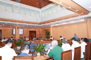 Quang cảnh hội nghị tại điểm cầu trụ sở UBND TP. Hà Nội.