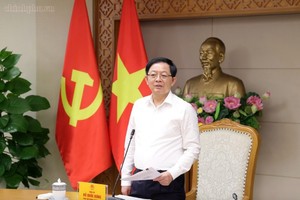 Phó Thủ tướng Hồ Quốc Dũng chủ trì cuộc họp với các bộ, cơ quan liên quan về dự án Luật Đất đai sửa đổi - Ảnh: chinhphu.vn