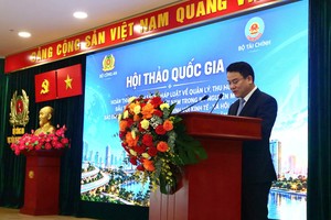 Thứ trưởng Bộ Tài chính Trần Quốc Phương tại Hội thảo. (Ảnh: Duy Thăng, HVAN). 