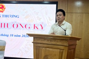 Ông Ngô Chung Khanh, Phó vụ trưởng Vụ Phát triển thị trường nước ngoài và Thương mại đa biên thông tin về tiến độ đàm phán Hiệp định Thương mại đối ứng Việt - Mỹ. (Ảnh: HY).