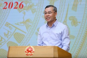 Bộ trưởng Bộ Tài chính Ngô Văn Tuấn báo cáo tại Hội nghị.