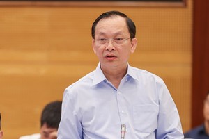 Ông Đào Minh Tú, Phó thống đốc NHNN trả lời tại buổi họp báo Chính phủ.