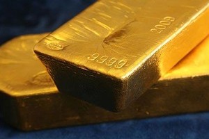 Tin Fed sẽ giảm kích thích, vàng xuống thấp nhất 7 tuần