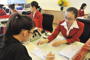 Dù hạ lãi suất, việc giải ngân vốn vay tại nhiều NH vẫn chậm