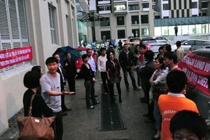 Nhiều vụ tranh chấp giữa cư dân và chủ đầu tư các tòa nhà có liên quan đến phí quản lý - Ảnh: VNE