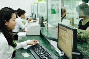 Ai sẽ theo Vietcombank hạ lãi suất huy động?