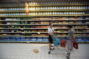 GDP Trung Quốc sẽ vẫn tăng trưởng chậm cho đến hết 2014. Ảnh: Bloomberg