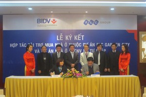 Thứ trưởng Bộ Tư pháp Lê Hồng Sơn tới dự Lễ ký kết giữa BIDV và FLC ngày 26/12/2013