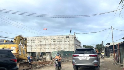 Dự án cải tạo và nâng cấp quốc lộ 14E gặp vướng mắc trong công tác giải phóng mặt bằng.