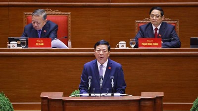 Bộ trưởng Bộ Xây dựng Trần Hồng Minh bày tham luận - Ảnh: TTXVN. 