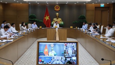 Phó Thủ tướng Thường trực Phạm Gia Túc làm việc về tình hình triển khai dự án đường sắt Lào Cai - Hà Nội - Hải Phòng - Ảnh: VGP