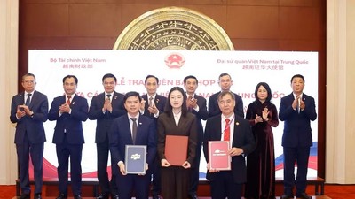 Lễ trao biên bản hợp tác giữa các doanh nghiệp Việt Nam-Trung Quốc ngày 14/4/2026. (Ảnh: Thống Nhất/TTXVN)