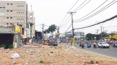 Giải phóng mặt bằng mở rộng Quốc lộ 13 là một trong những dự án có tỷ lệ giải ngân cao. Ảnh: Lê Toàn