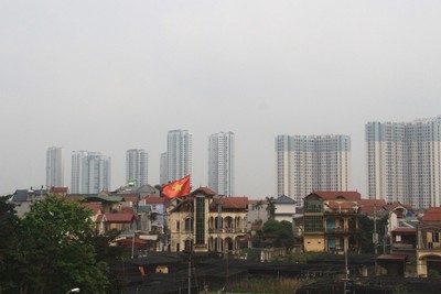 Các dự án nhà ở đang lan ra vùng ngoại vi theo vệt loang đô thị. Ảnh: Bình Minh.