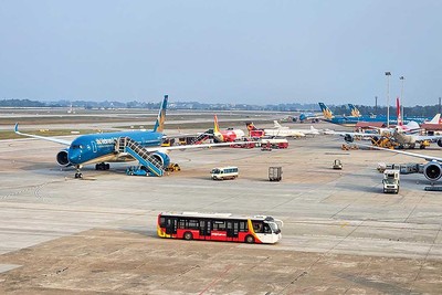 Hoạt động khai thác hàng không tại sân bay Nội Bài (Ảnh: PV) 