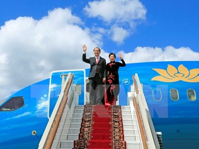 Chủ tịch nước Trần Đại Quang và Phu nhân đến sân bay Vnukovo 2. (Ảnh: Nhan Sáng/TTXVN)