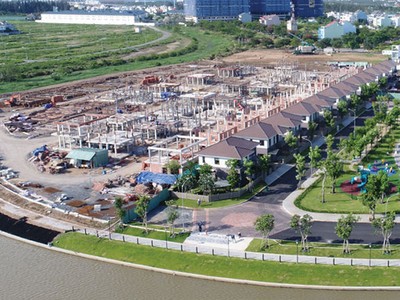 Theo các chuyên gia, thị trường bất động sản sẽ tiếp tục duy trì đà tăng vững chắc trong năm 2018 . Ảnh: Lê Toàn