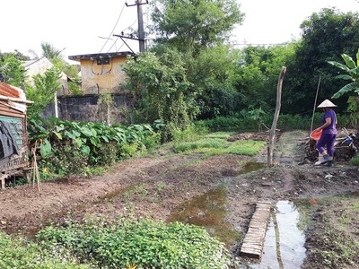 Không dễ để người dân có thể chuyển đổi mục đích sử dụng đất và có được sổ đỏ với đất xen kẹt. Ảnh: Nhất Nam