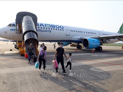 Hành khách đi trên chuyến bay của Bamboo Airways. Ảnh minh họa: Huy Hùng/TTXVN