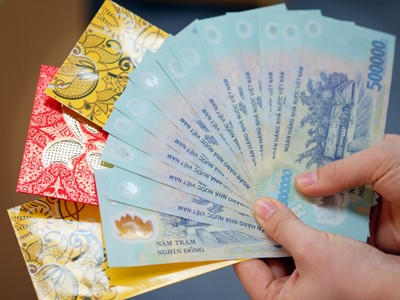 Không hiếm trường hợp nhân viên các công ty nhận lì xì tiền triệu từ các sếp, đồng nghiệp. Ảnh: K.D